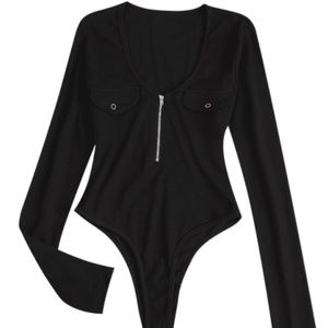 Black ribbed zip up bodysuit with pockets